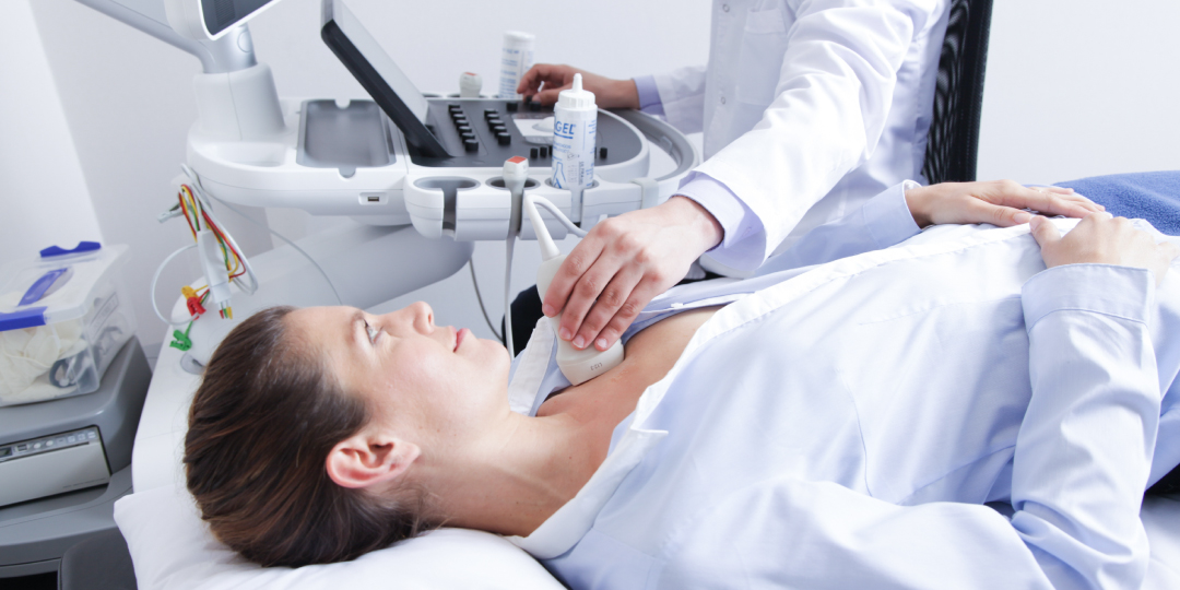 woman getting a heart ultrasound