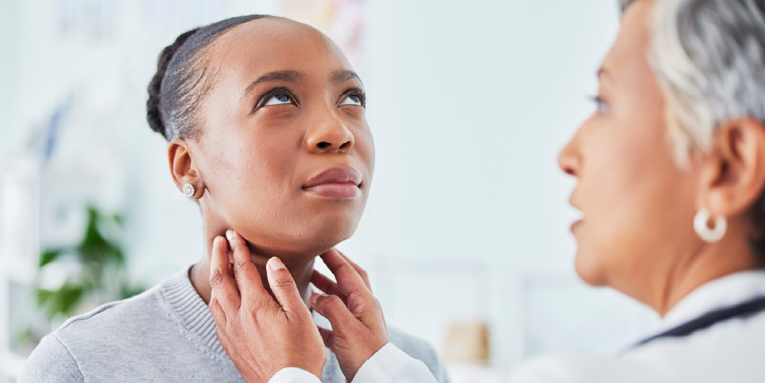 doctor checking a patient's parathyroid glands 