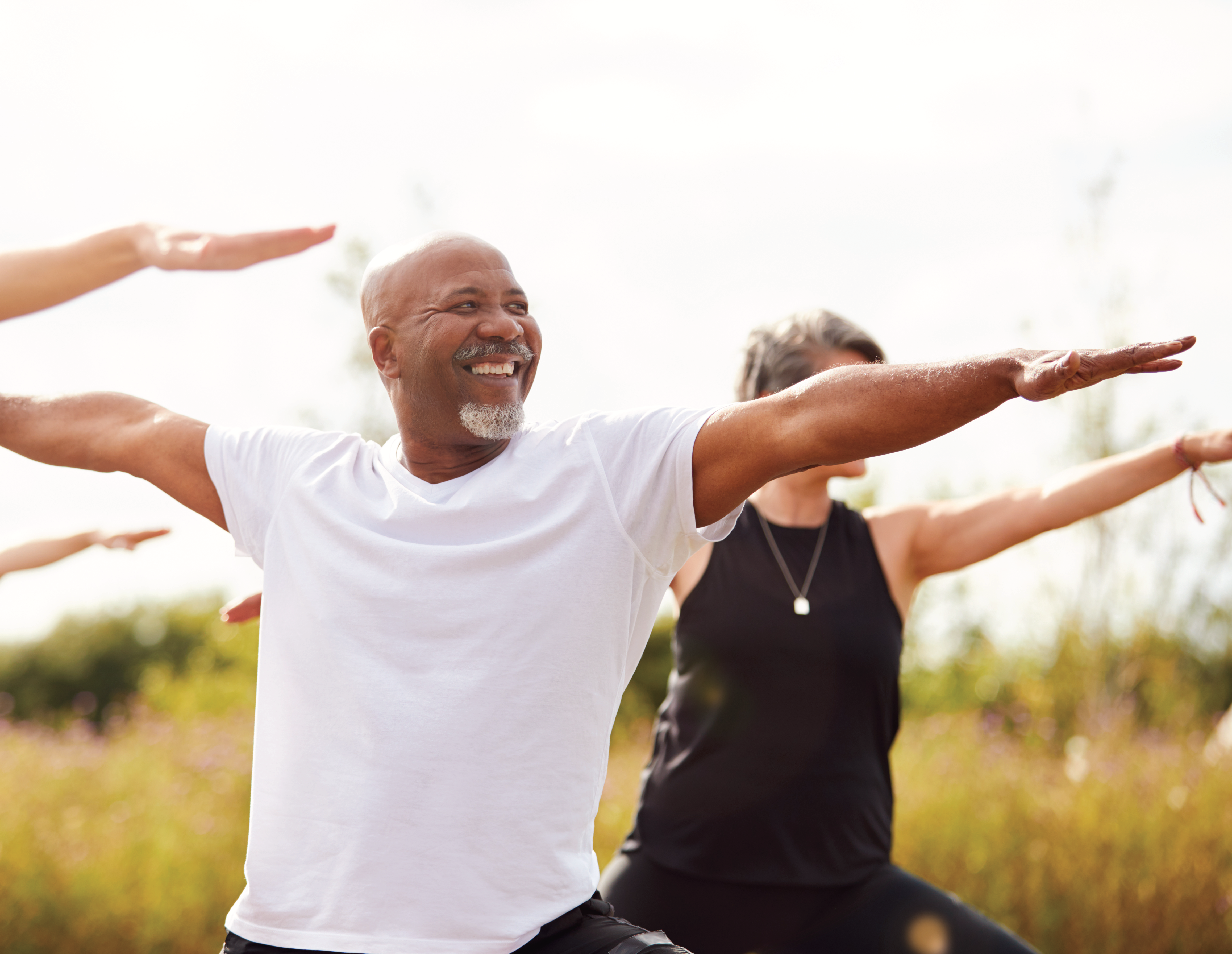 group of people working out outside 