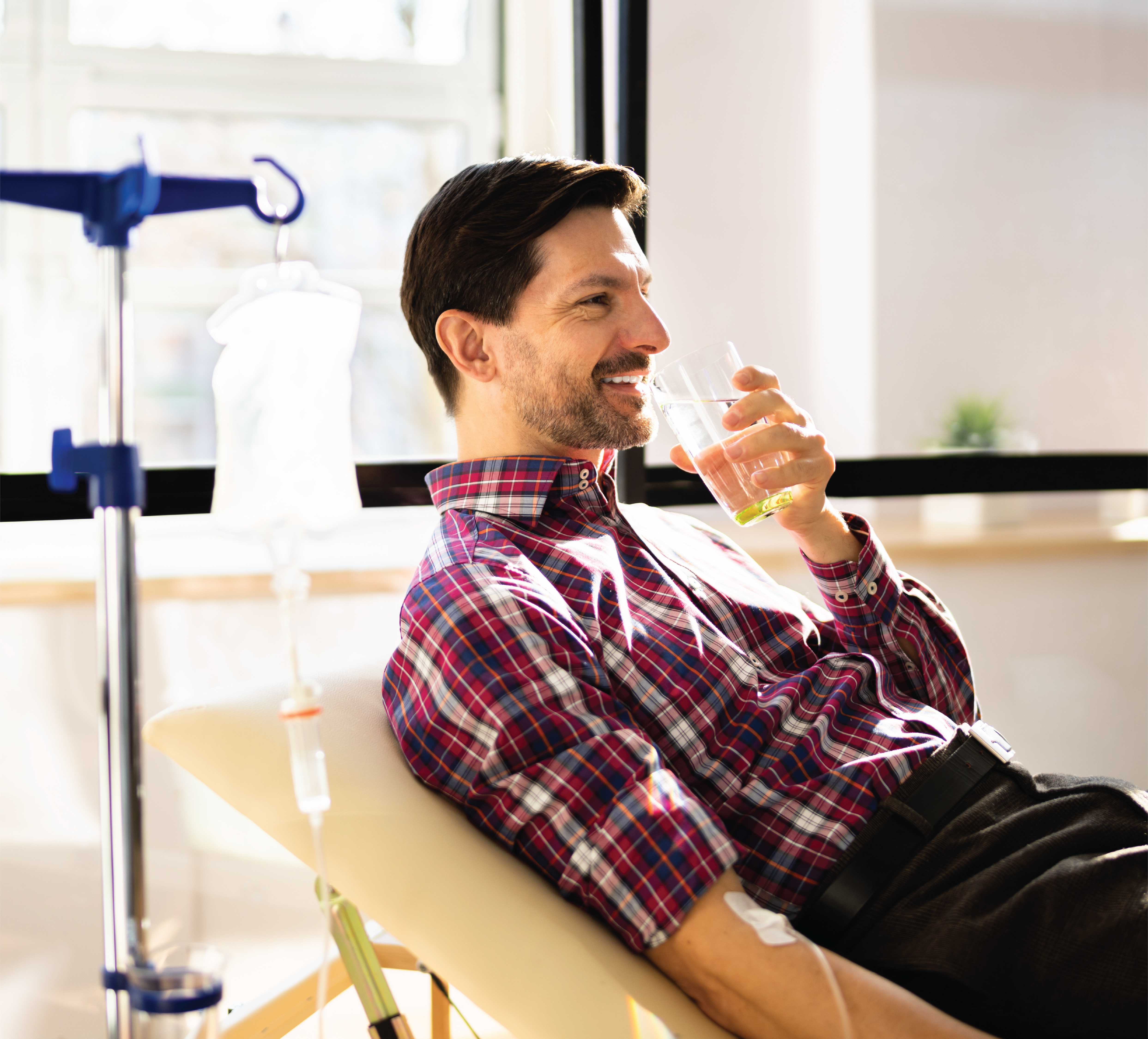 man receiving vitamins via an IV