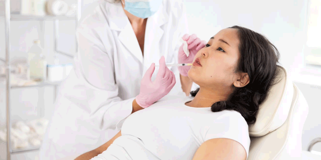 woman receiving lip filler 
